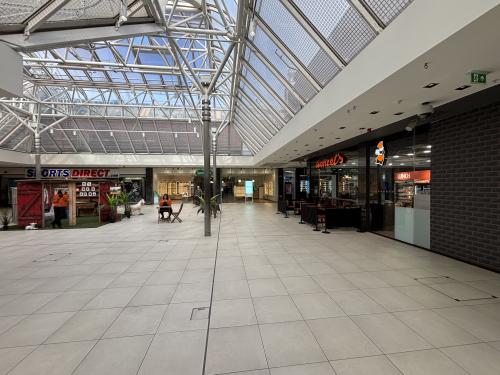 Unit 24 Victoria Place Shopping Centre, Wolsey Walk, Woking, GU21