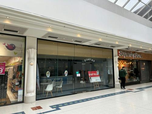 57, Peacocks Shopping Centre, Woking, GU21