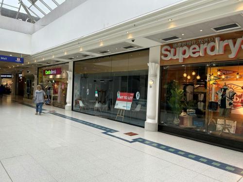 57, Peacocks Shopping Centre, Woking, GU21