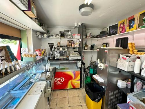 Cafe Kiosk at Dukes Meadows Paddling Pool, Alexandra Gardens, Chiswick, London, W4
